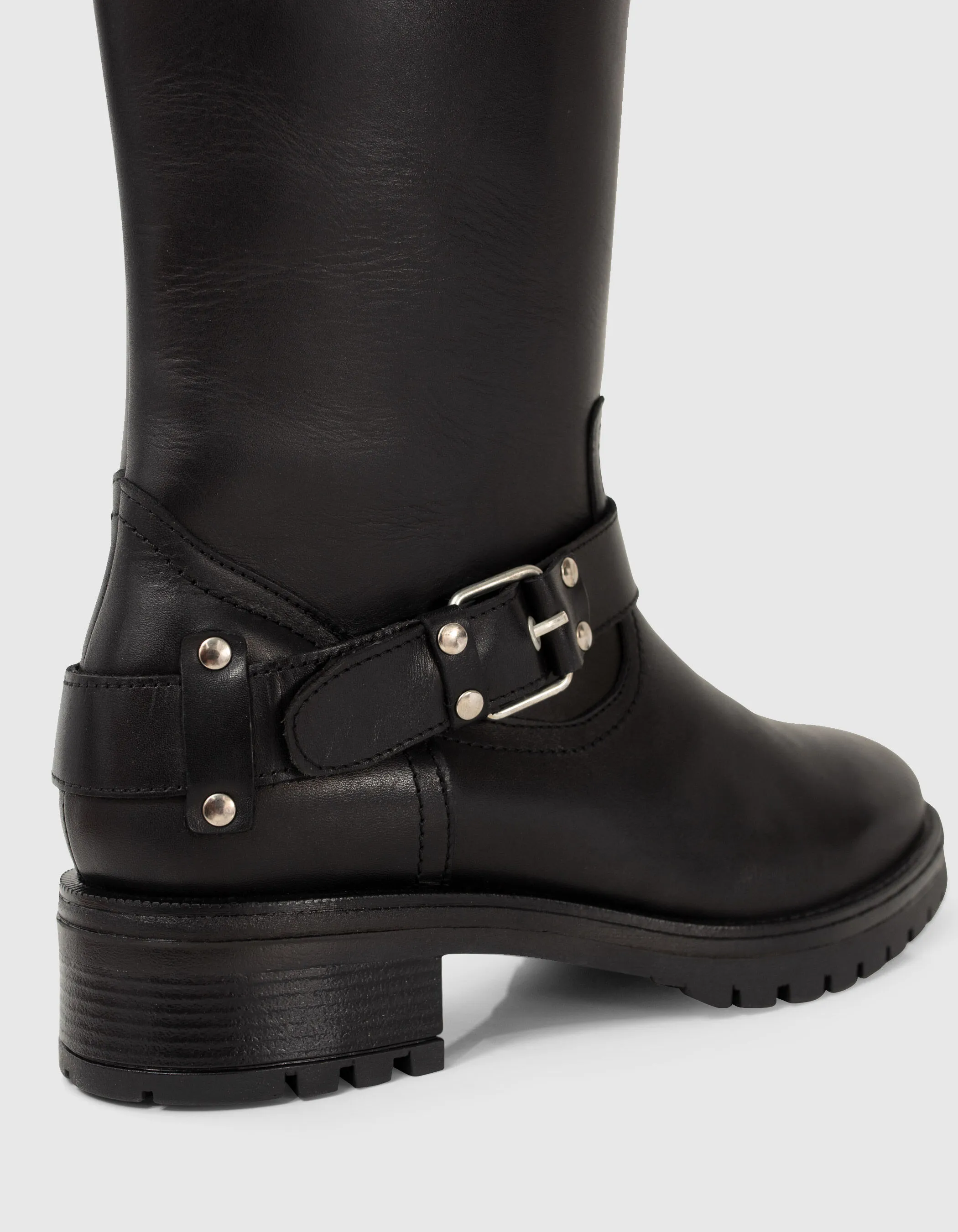 Black leather biker boots with cleated soles Women