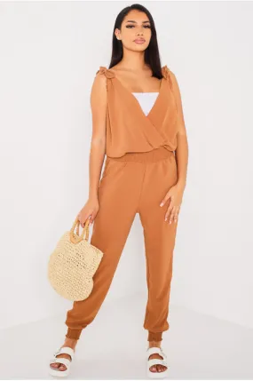 Fluid camel pantsuit with knotted sleeves